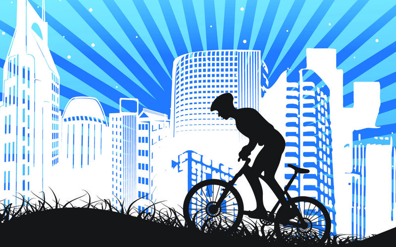 cyclist in cityscape
