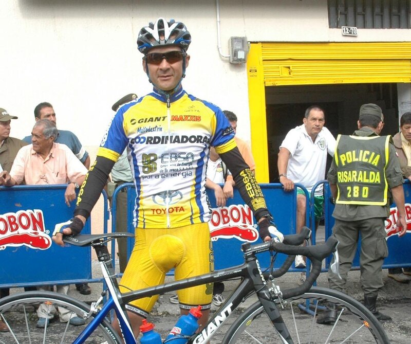 Cyclist in yellow and blue jersey