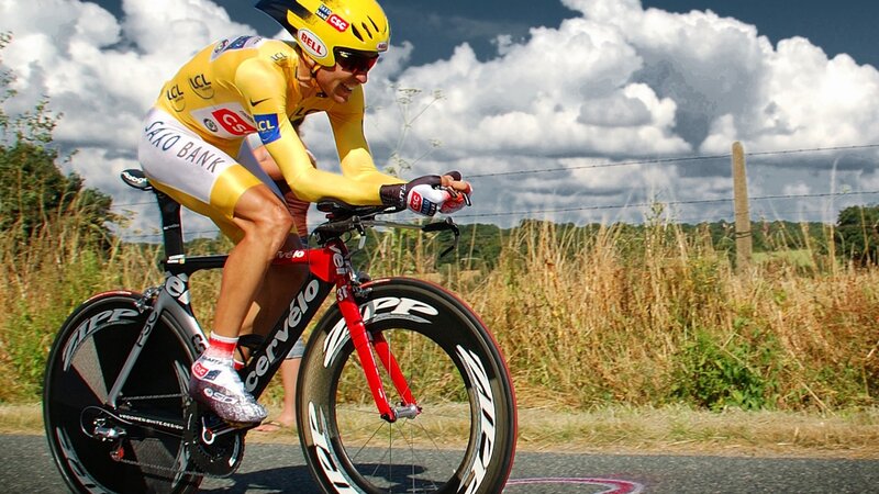 Cyclist in Yellow Jersey — Dramatic