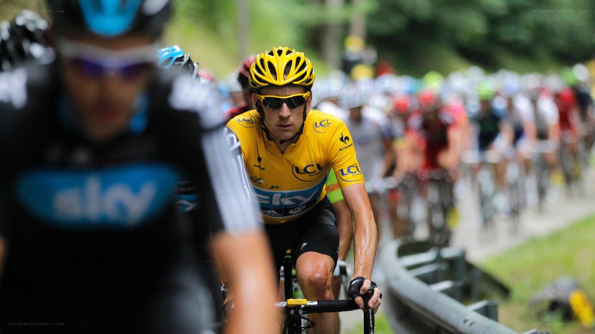 Cyclist in yellow jersey