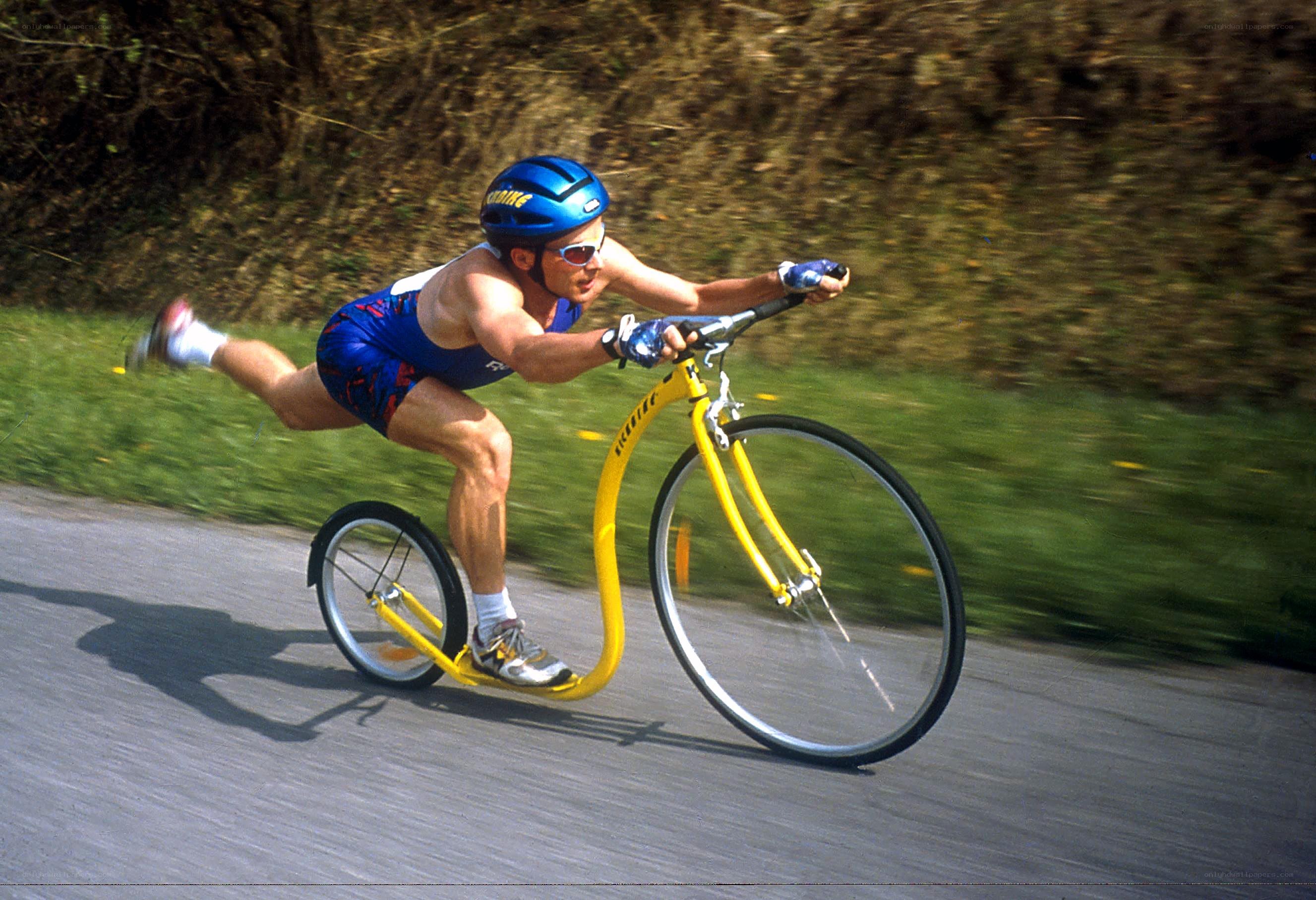 cyclist on a yellow bike