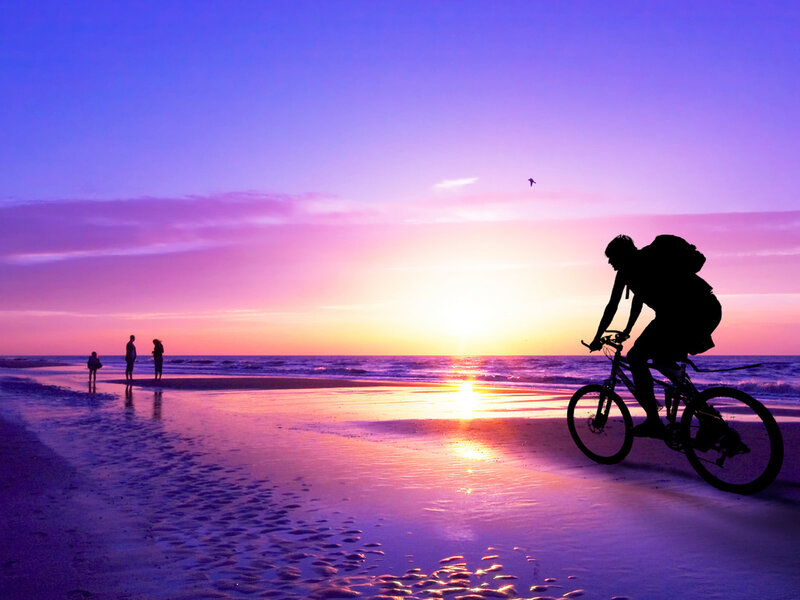 Cyclist on Beach