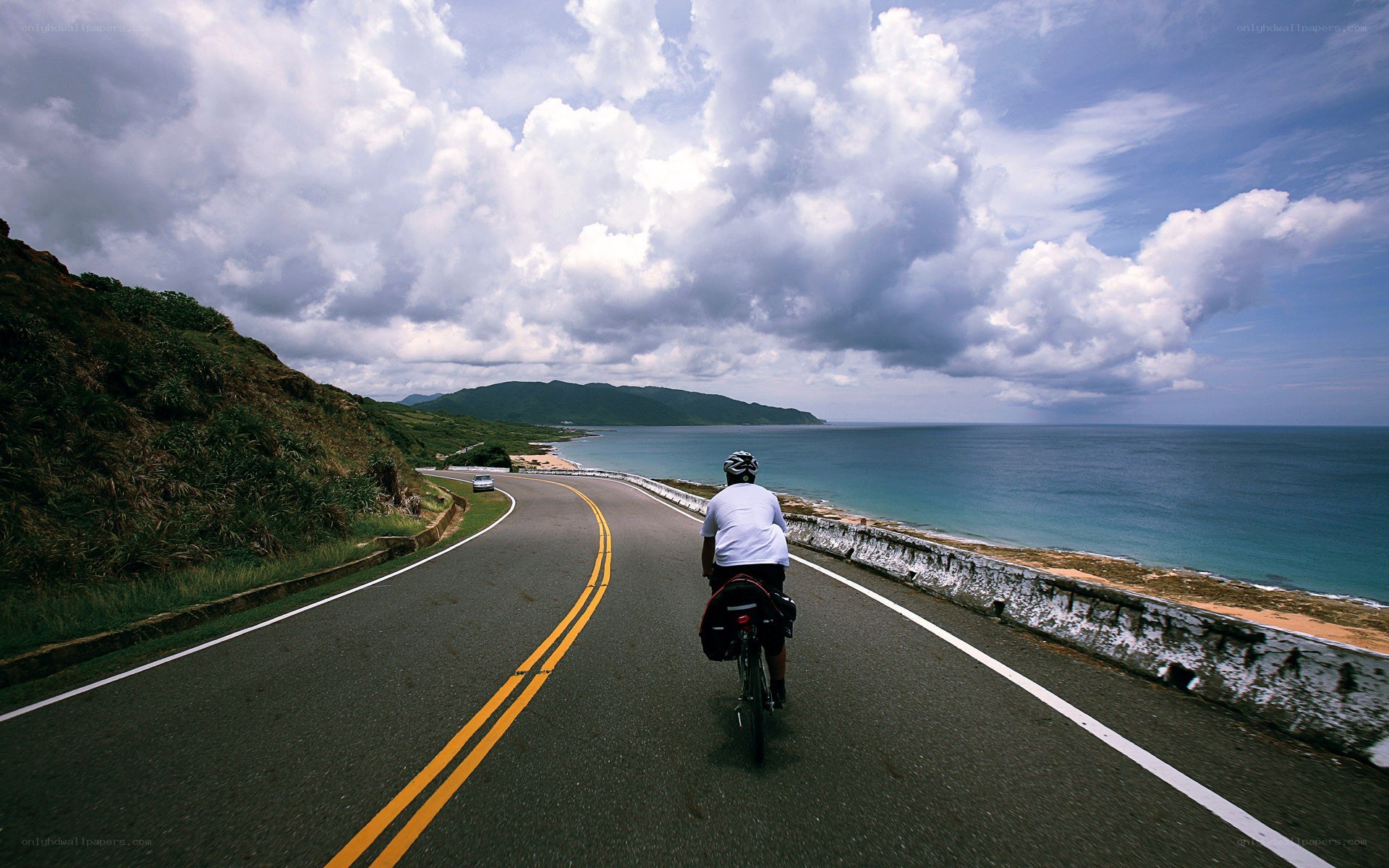Cyclist on coastal road