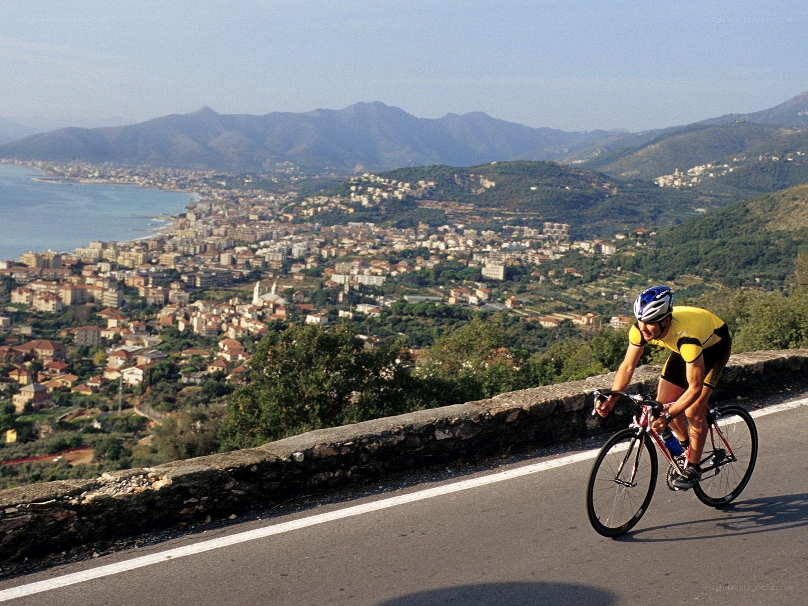 Cyclist on coastal road