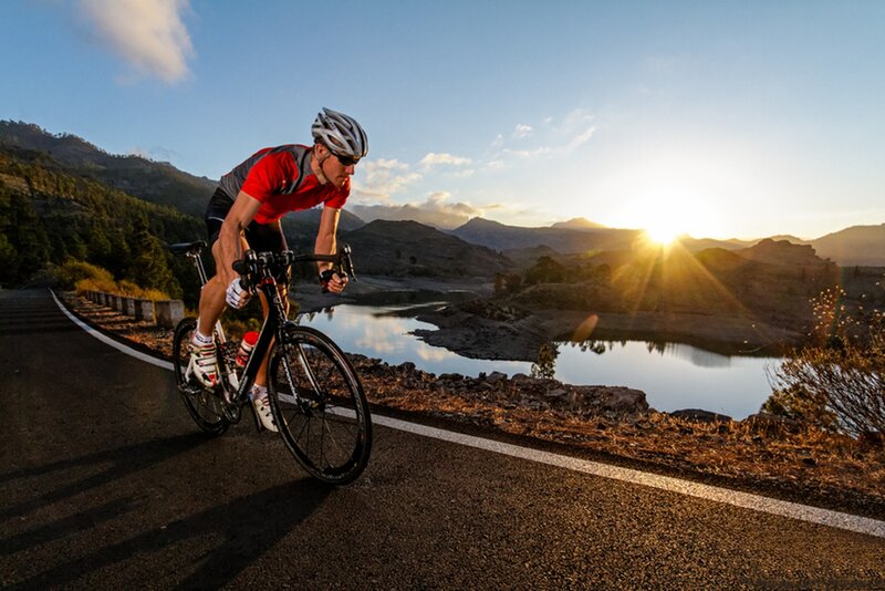 Cyclist on Mountain Road — Blue, Serene