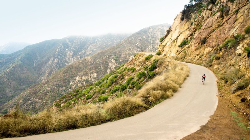 Cyclist on mountain road