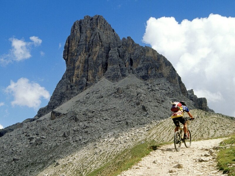 Cyclist on mountain trail