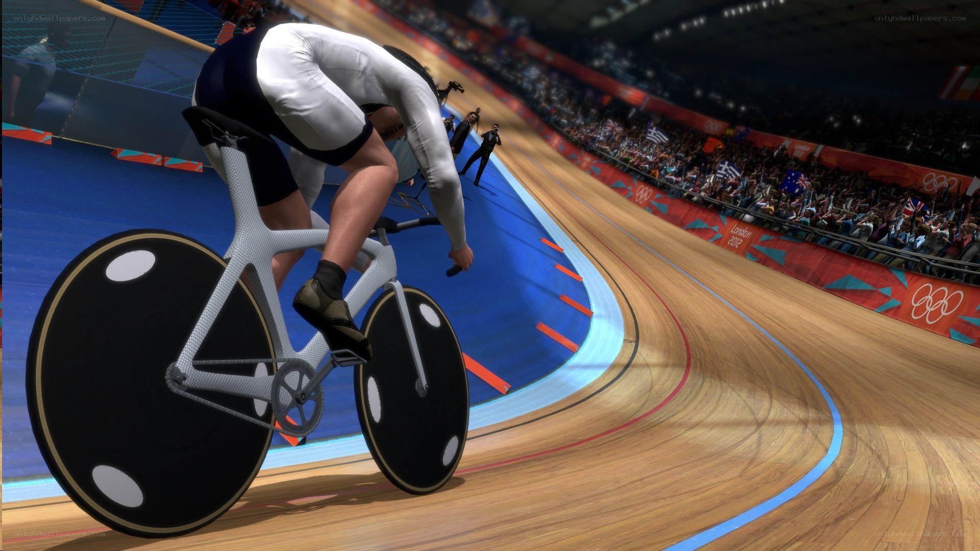 Cyclist on velodrome track