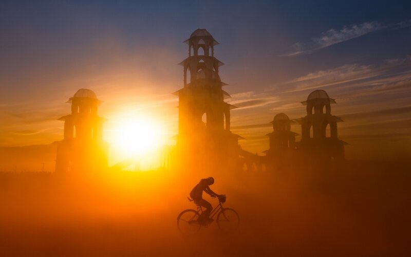 Cyclist Riding at Sunset