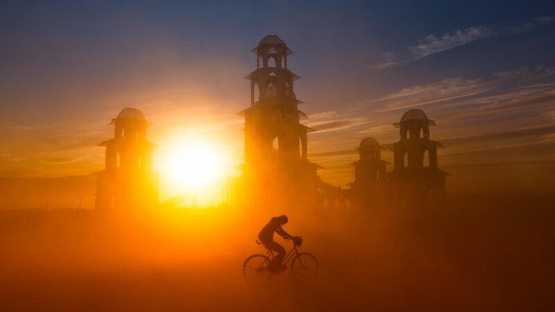 Cyclist Riding in Fog — Orange