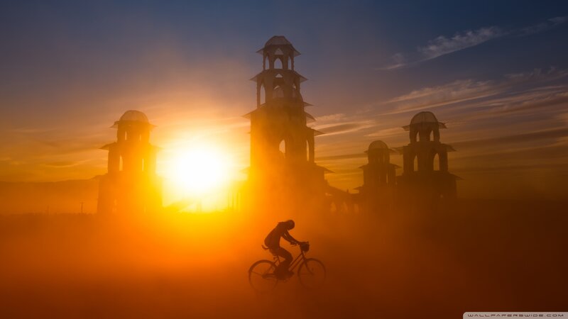 Cyclist Silhouetted at Sunset