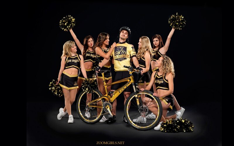 Cyclist with Cheerleaders