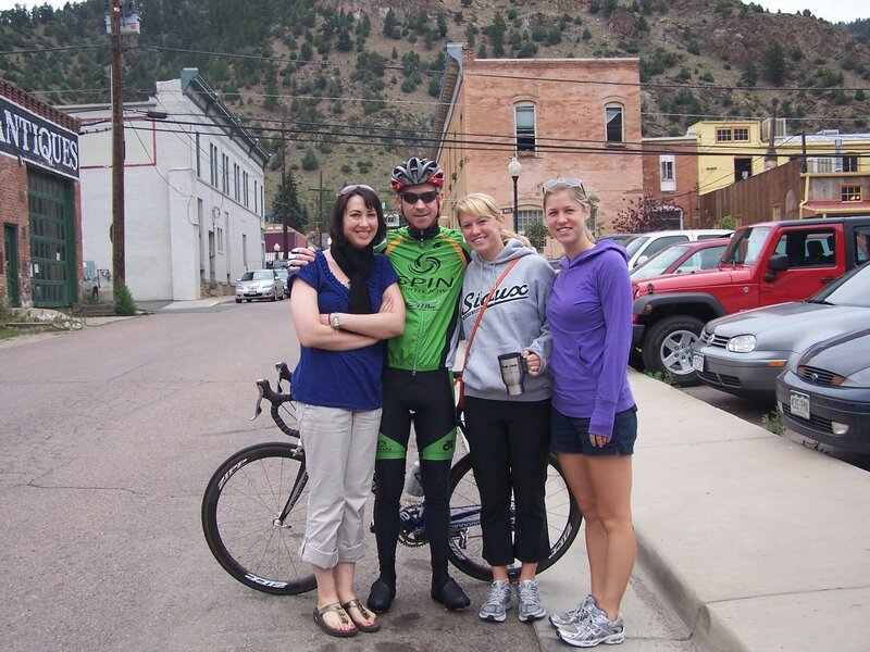Cyclist with Three Women