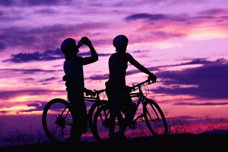 Cyclists at sunset