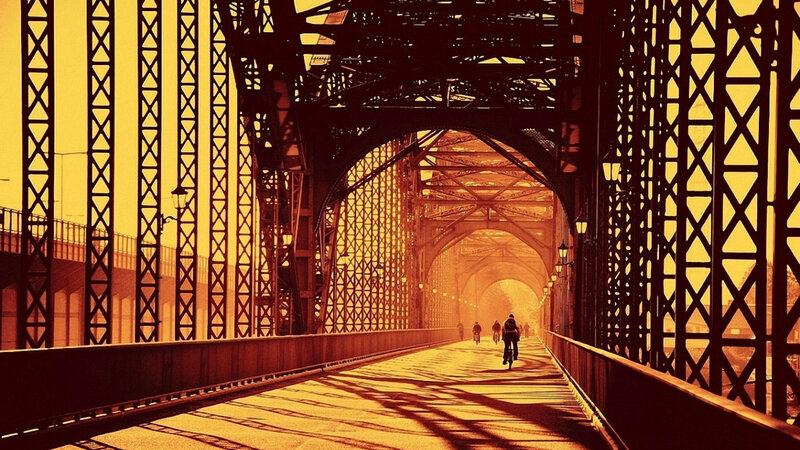 Cyclists on a Bridge