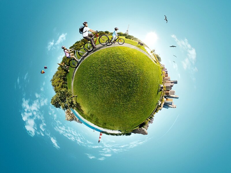 Cyclists on a Globe