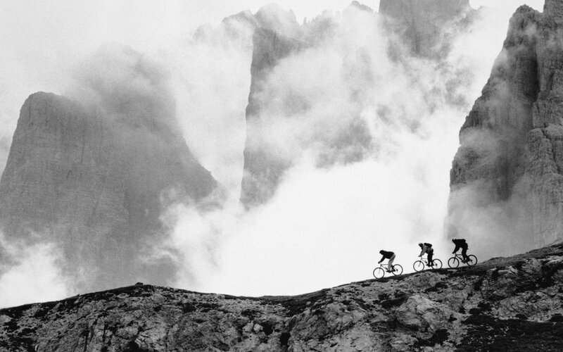 Cyclists on a mountain ridge