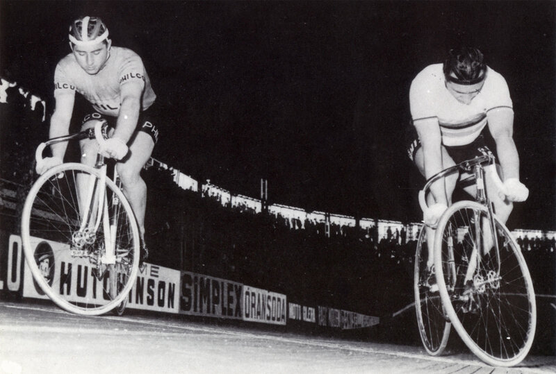 Cyclists racing at night