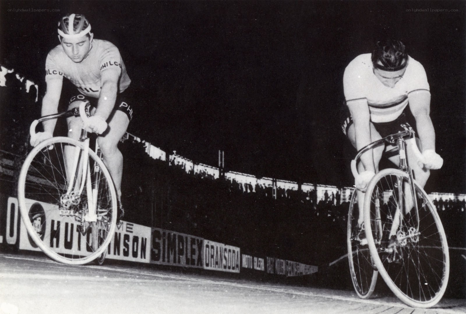 Cyclists racing at night