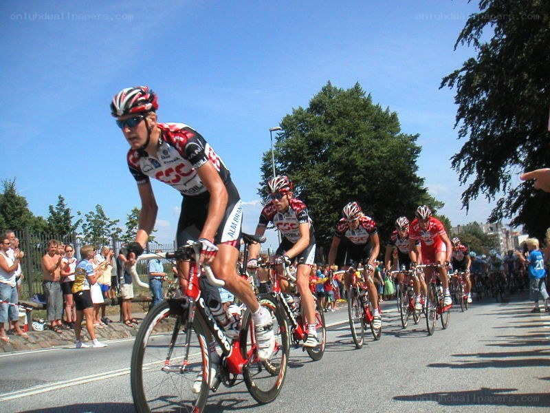 Cyclists racing in a peloton