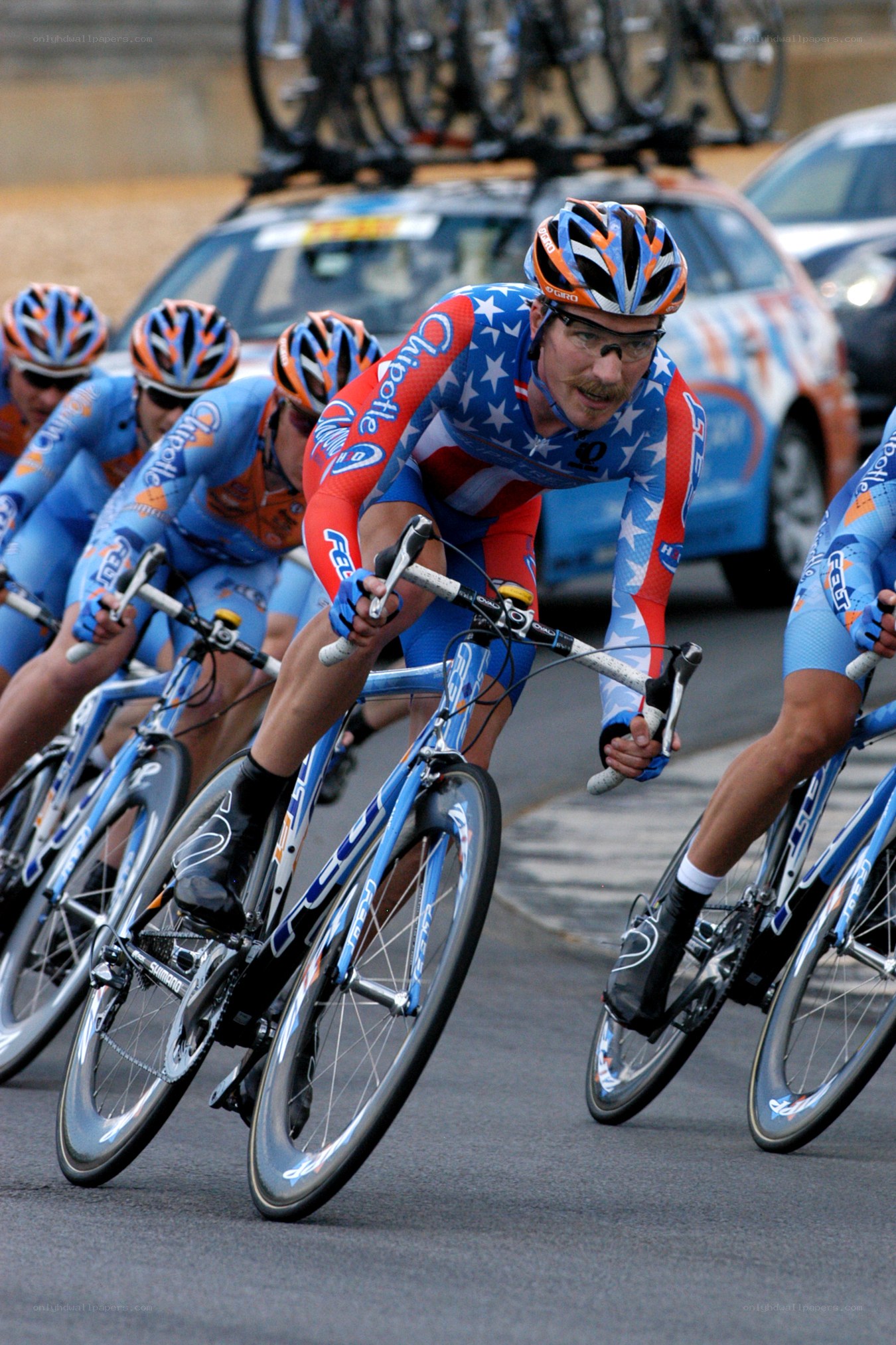 Cyclists racing in a peloton