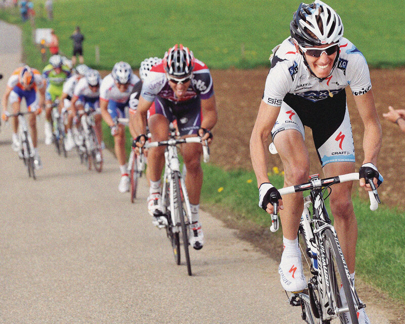 Cyclists racing on a road