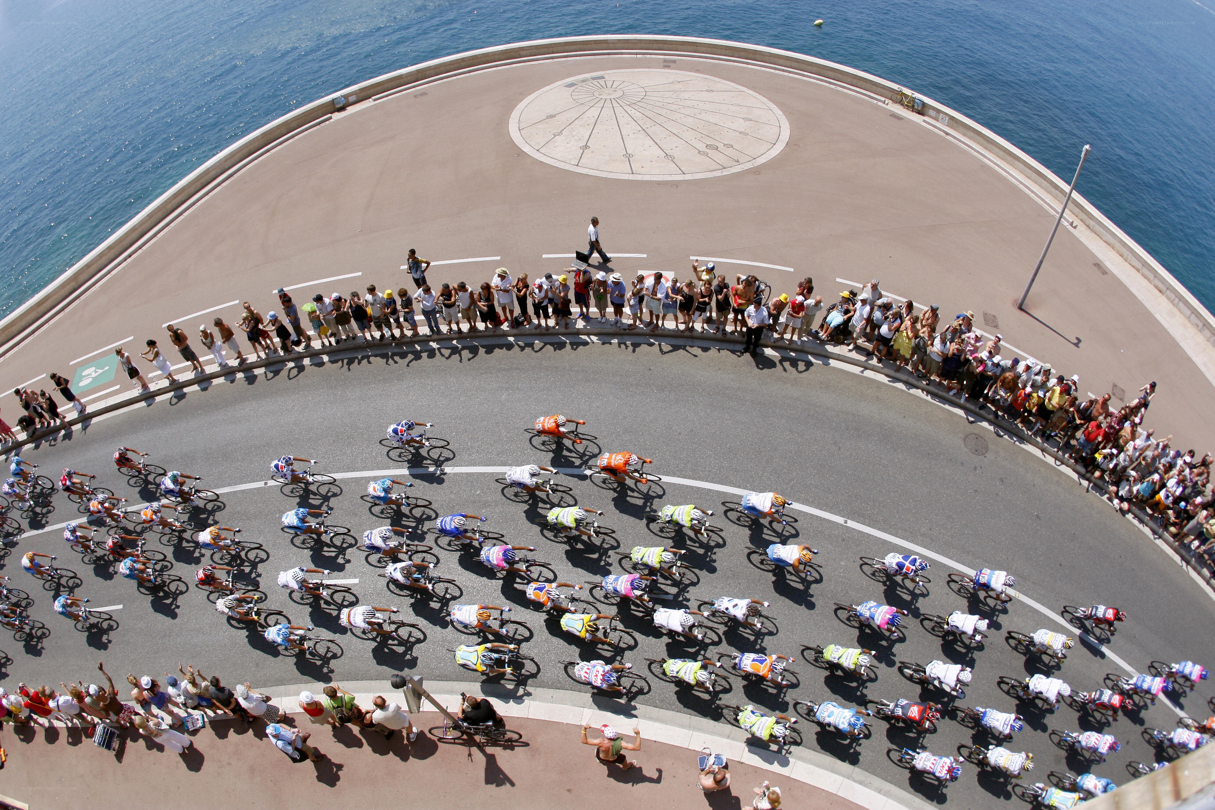 Cyclists racing on coastal road