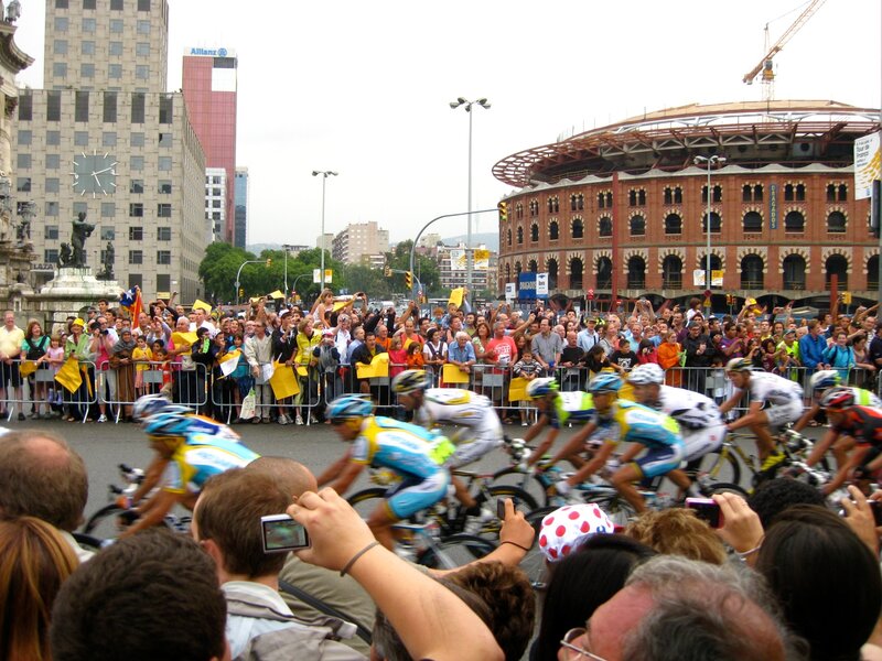 Cyclists racing through a city