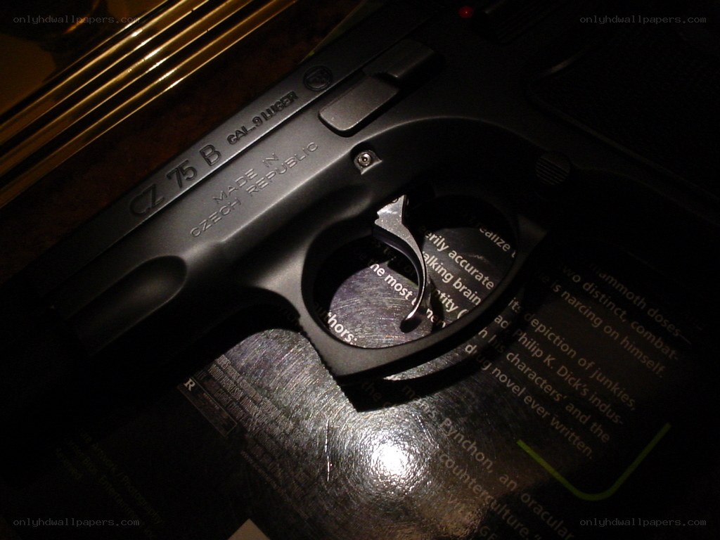 CZ 75 B pistol on book