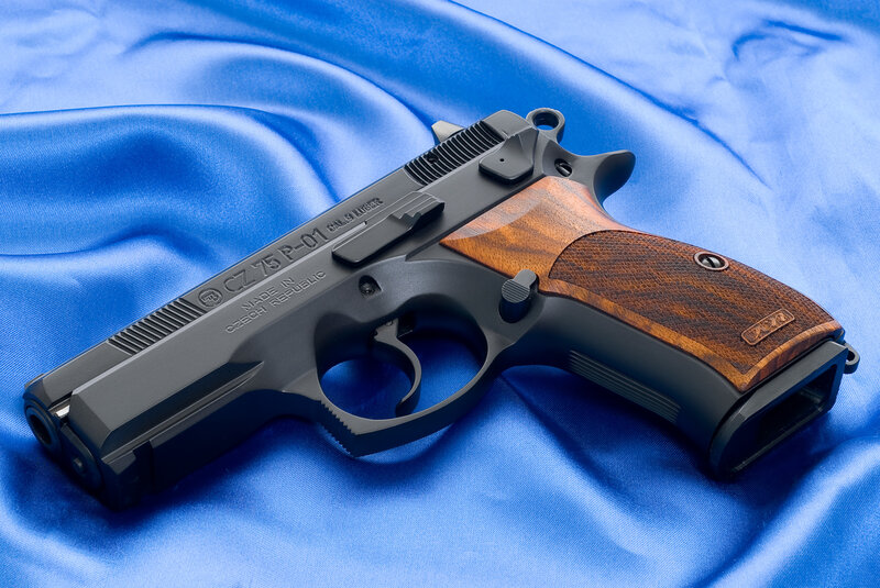 CZ 75 P-01 pistol on blue fabric
