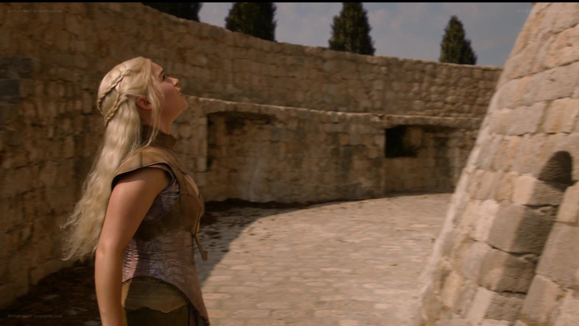Daenerys in a stone courtyard