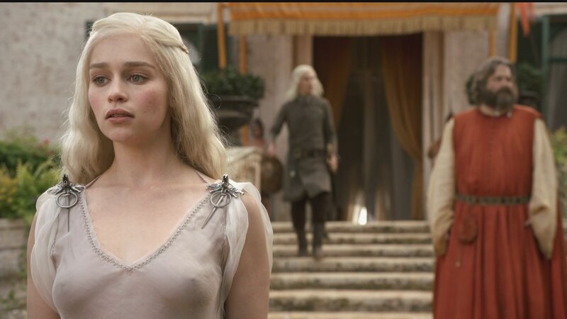 Daenerys Targaryen in a courtyard