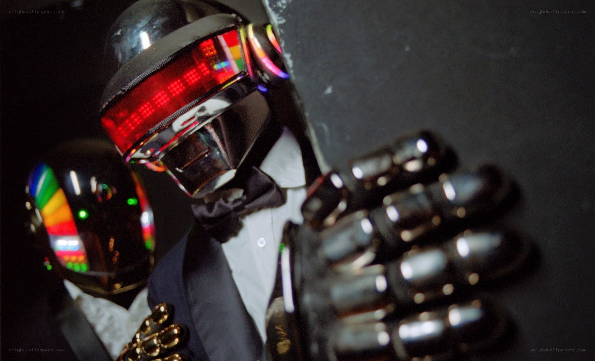 Daft Punk in futuristic helmets