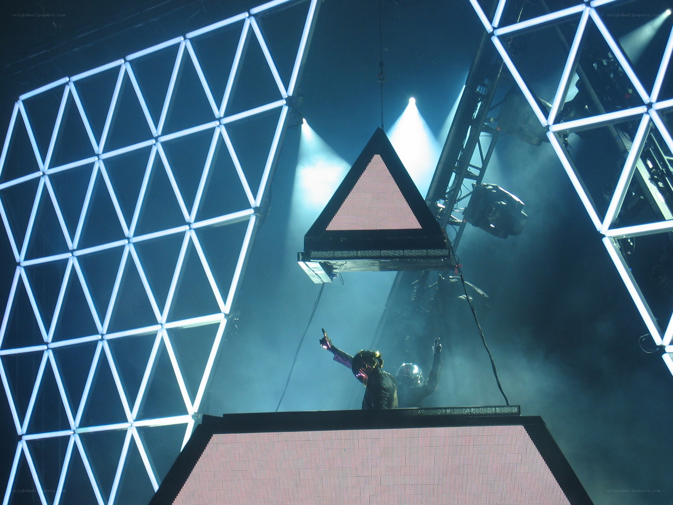 Daft Punk performing on stage