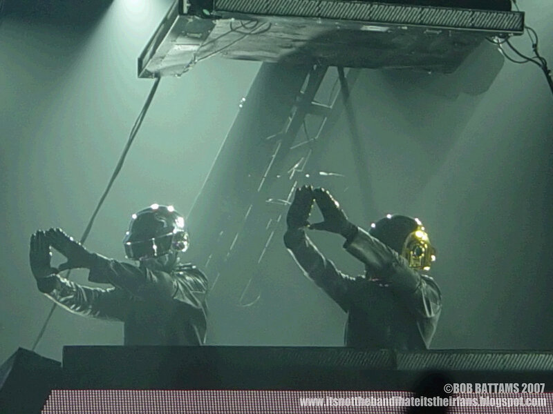 Daft Punk performing on stage