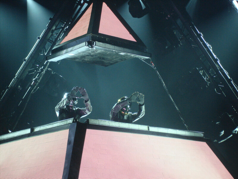 Daft Punk performing on stage