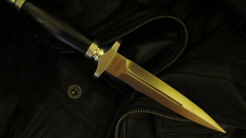 dagger on black jacket