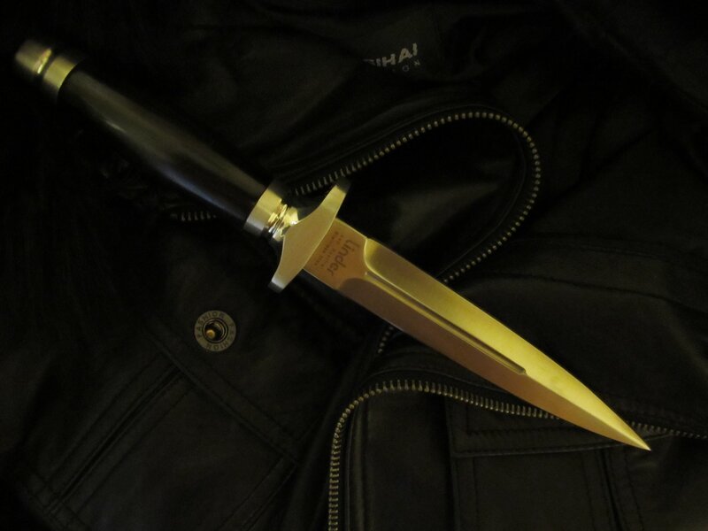 dagger on black jacket
