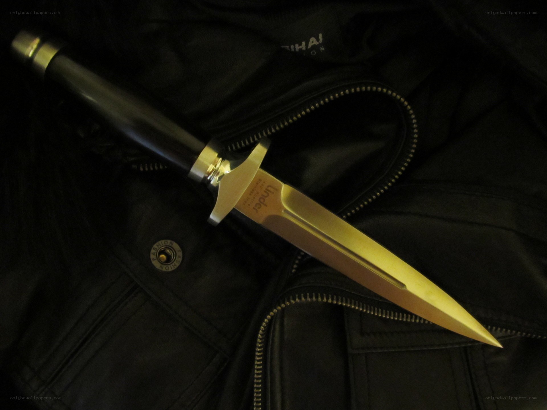dagger on black jacket