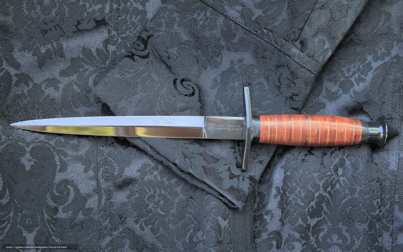 dagger on patterned fabric