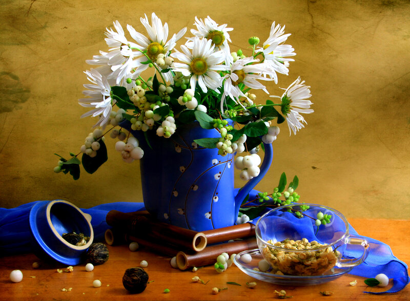 Daisies in Blue Pitcher
