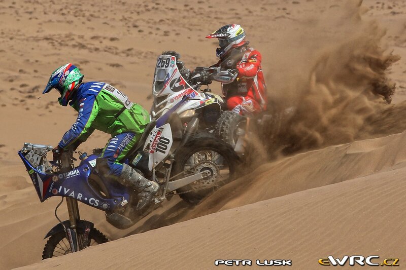 Dakar Rally racers on sand dunes