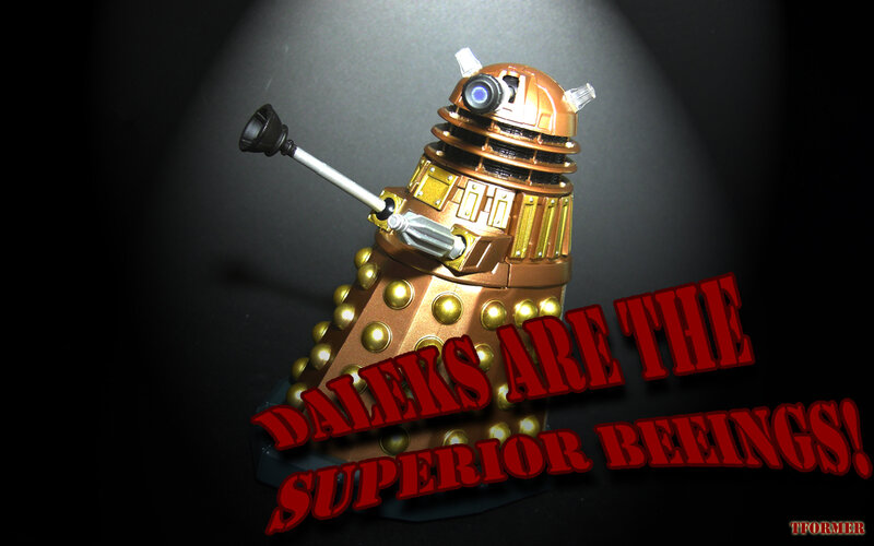 Dalek figure with text