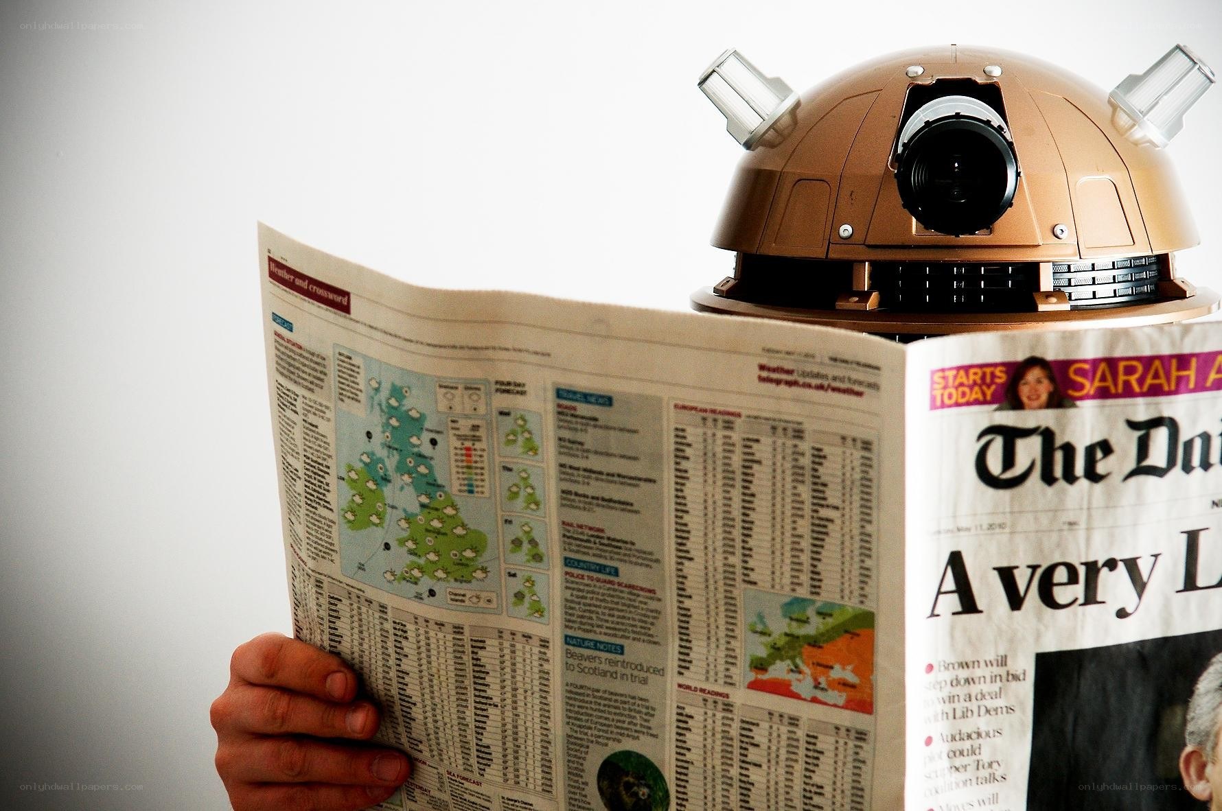 Dalek reading newspaper