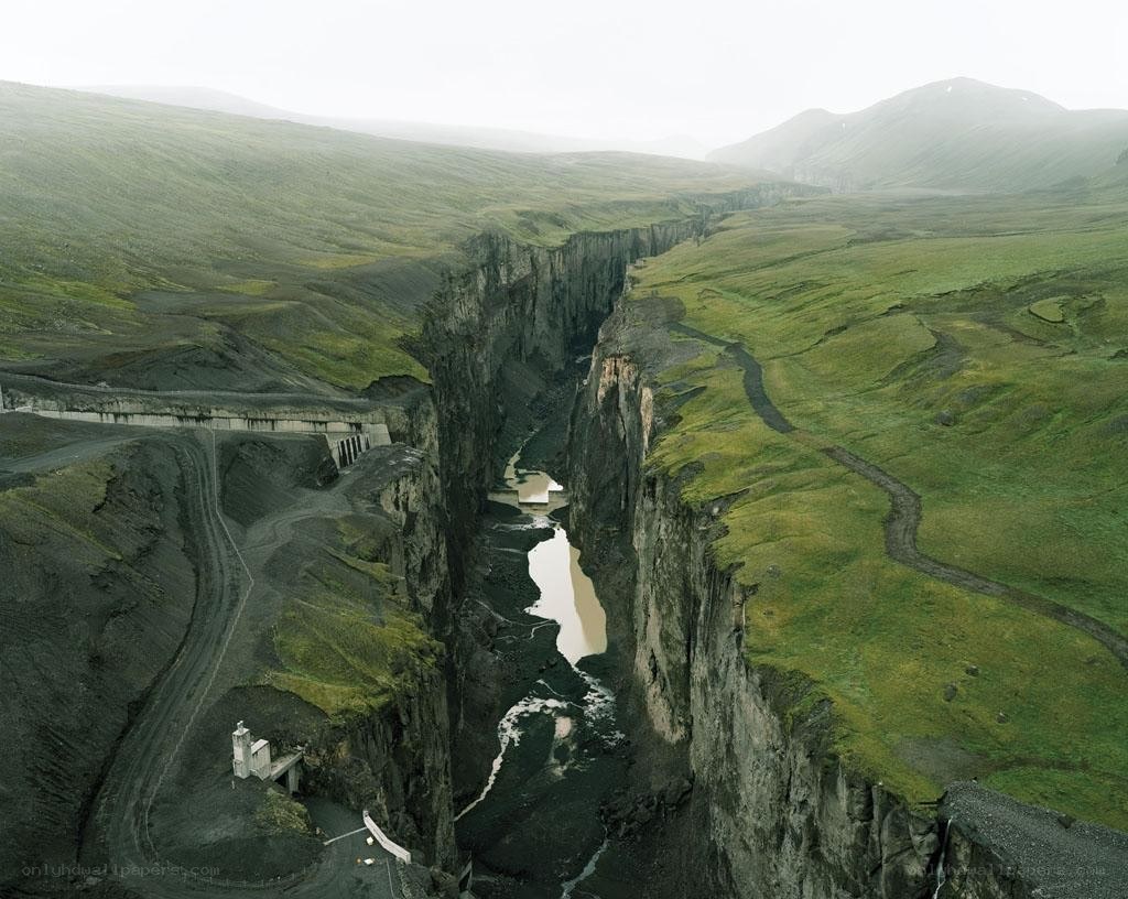 Dam in a green canyon