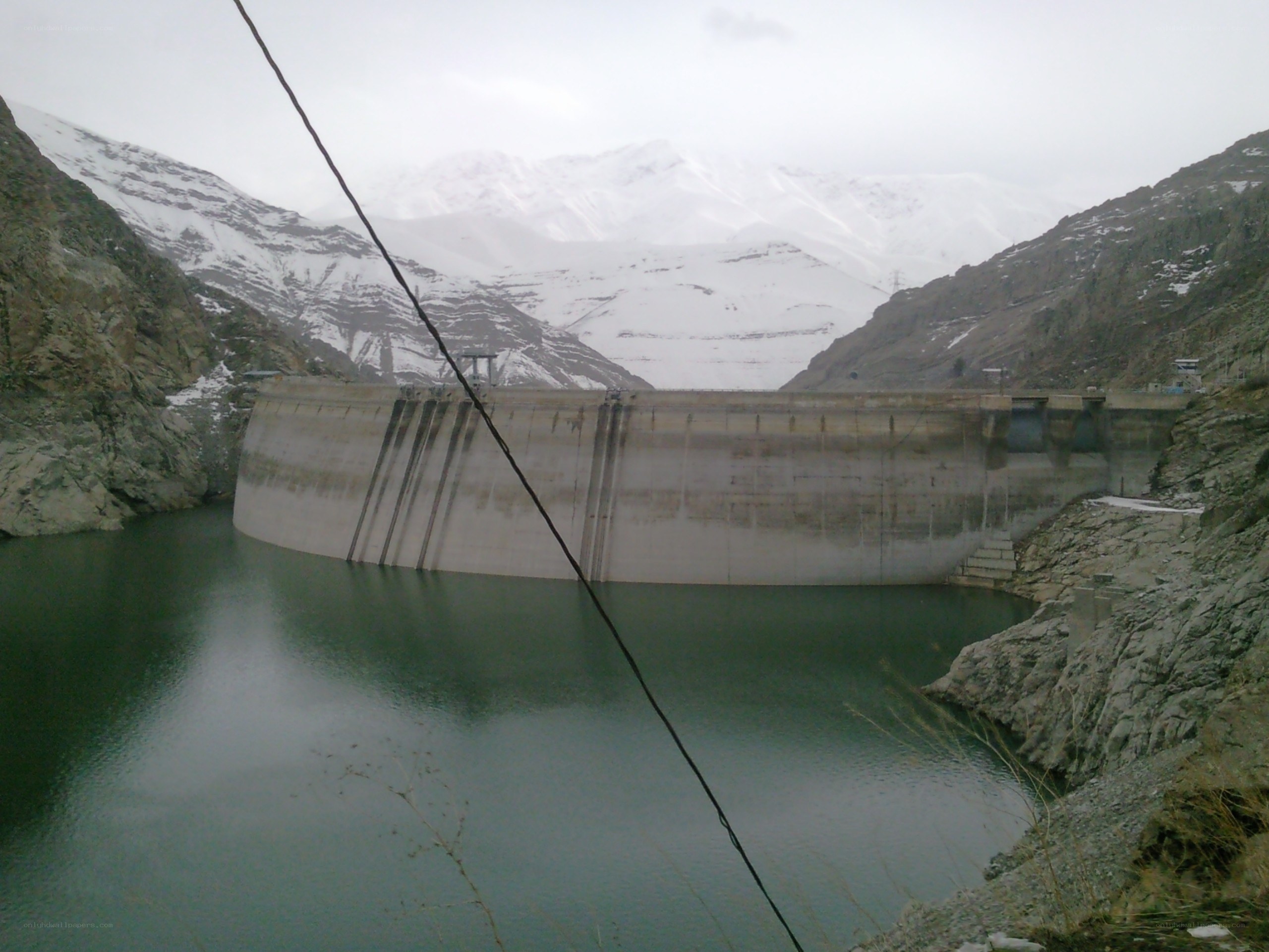 Dam in snowy mountains