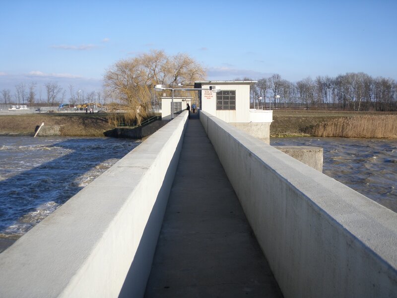 Dam walkway with river flow