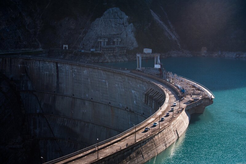 Dam with cars on road