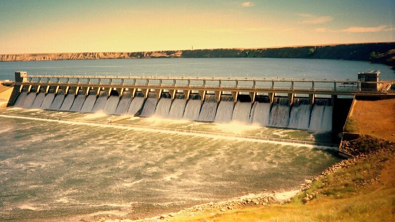Dam with Water Flowing — Blue, Calm