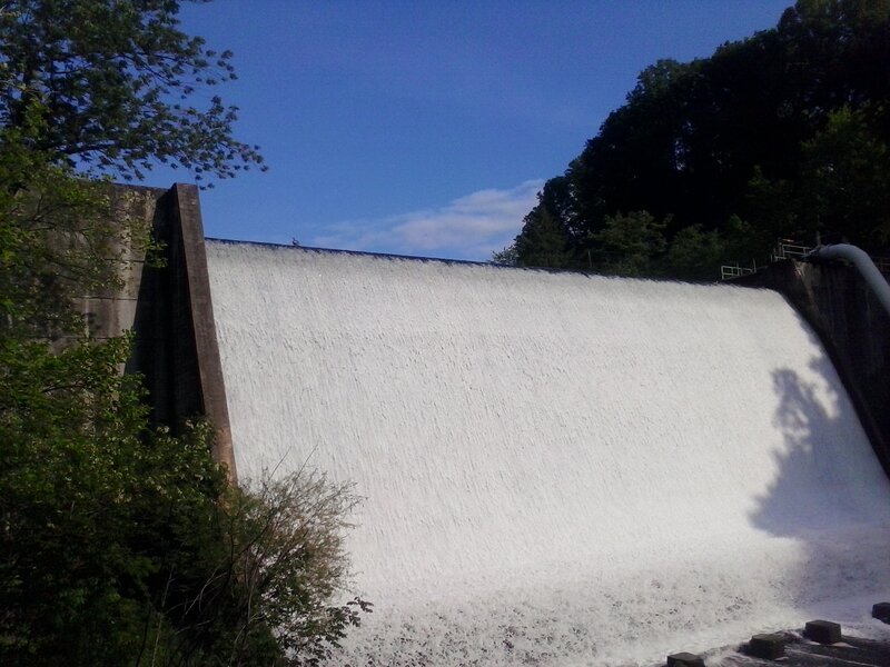 Dam with Water Flowing — Blue